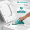 A person is cleaning a toilet seat that is detached from the toilet bowl, highlighting its removable feature for easy cleaning. Produktbild-Vorschau