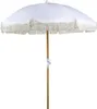 A white fringed parasol with a wooden pole against a white background. Náhľad obrázku produktu