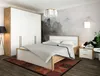 A bedroom with a bed, wardrobe, and nightstand. Náhled obrázku produktu