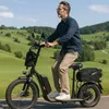A man rides an electric scooter through a scenic countryside. Produktbild-Vorschau