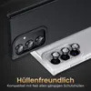 Close-up view of two smartphone camera lens protectors, one black and one clear, with German text overlay. Produktbild-Vorschau