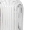 A close-up of a clear glass carafe with vertical ridges. Náhľad obrázku produktu