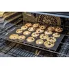 Cookies baking on a baking sheet inside an oven. Produktbild-Vorschau