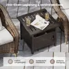 An outdoor table and chairs set on a patio. Podgląd zdjęcia produktu