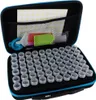 An open storage case for diamond painting supplies, filled with small plastic containers and accessories. Anteprima dell’immagine prodotto