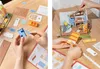 Two images showing hands assembling a miniature wooden house model. Anteprima dell’immagine prodotto