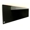 A black, triangular-shaped device with a glossy finish, mounted on a white background. Náhled obrázku produktu