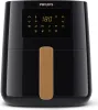A black Philips Airfryer 5000 Series is shown against a white background. The airfryer has a digital display showing cooking settings and temperature. Produktbild-Vorschau