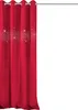 A red curtain with sparkling details hanging from a curtain rod. Produktbild-Vorschau