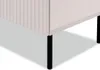 A close-up view of the bottom corner of a light-colored cabinet with black metal legs. Náhled obrázku produktu