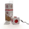 A product shot of a PowerCube Extended with its packaging and accessories, set against a white background. Produktbild-Vorschau