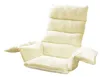 A cream-colored, plush armchair cushion with armrests, isolated on a white background. Náhled obrázku produktu