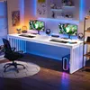 A modern gaming setup with a large white desk, two monitors, gaming peripherals, and ambient blue lighting. Anteprima dell’immagine prodotto