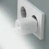 A white Belkin USB-C charger plugged into a white electrical outlet. Náhľad obrázku produktu