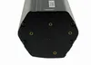 The bottom of a black, hexagonal e-bike battery is shown against a white background. There are several screw holes and threaded inserts visible on the bottom plate. Produktbild-Vorschau