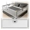 A baby bed rail is shown installed on a bed, with a second image showing a close-up of the bed rail. Produktbild-Vorschau