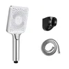 A shower head, hose, and wall mount are displayed against a white background. Náhľad obrázku produktu