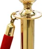 A close-up of a gold stanchion with a red rope attached. Produktbild-Vorschau