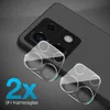 A close-up marketing image showing two camera lens protectors placed in front of a smartphone's camera module. Produktbild-Vorschau