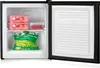 An open mini-freezer filled with frozen food items. Náhľad obrázku produktu