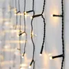 A close-up view of a string of warm white LED lights hanging vertically against a white background. Náhľad obrázku produktu