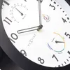 A close-up of a clock face with integrated thermometer and hydrometer. Náhled obrázku produktu