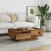 A living room scene with a couch, coffee table, and plant. Produktbild-Vorschau