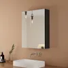 A bathroom vanity with a sink, faucet, and a medicine cabinet with a mirror. Podgląd zdjęcia produktu