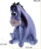 A statue of the Disney character Eeyore is shown against a white background, with dimensions indicated by text and lines. Produktbild-Vorschau