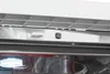 Close-up of the top edge of a dishwasher, showing the interior and some external components. Produktbild-Vorschau