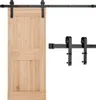 A wooden barn door and its black metal sliding hardware are displayed against a white background. Podgląd zdjęcia produktu