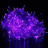 A pile of purple LED string lights on a black background. Produktbild-Vorschau