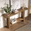 A wooden console table with decorative items on it, placed against a white paneled wall. Podgląd zdjęcia produktu
