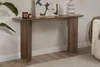 A console table with decor items and a plant in a room. Voir les images du produit