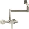 A silver pot filler faucet with a foldable arm is shown against a white background. Podgląd zdjęcia produktu