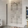 A modern bathroom with a walk-in shower.