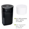A black dehumidifier unit and a white refill block are displayed against a white background. Text describes the included granulate block. Produktbild-Vorschau