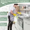 A man is cleaning a kitchen stove with a handheld steam cleaner. Náhľad obrázku produktu