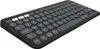 A black wireless keyboard with round keys is shown from a diagonal angle on a white background. Produktbild-Vorschau