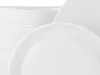 A close-up view of stacked white ceramic plates. Produktbild-Vorschau