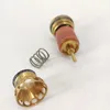 A disassembled plumbing valve component and a spring are laid out on a white surface. Produktbild-Vorschau