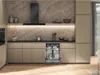 A modern kitchen with a dishwasher open and loaded with dishes. Anteprima dell’immagine prodotto