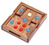 A wooden sliding puzzle with colorful marbles. Produktbild-Vorschau