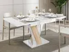A dining table set with place settings in a modern dining room. Anteprima dell’immagine prodotto
