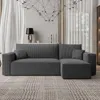 A modern living room scene featuring a gray sectional sofa. Produktbild-Vorschau