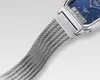 Close-up of a Casio watch with a blue dial and a silver mesh band. Produktbild-Vorschau