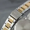 A close-up shot of a watch clasp and bracelet. Anteprima dell’immagine prodotto