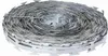 A roll of razor wire is shown against a white background. Voir les images du produit