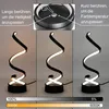 A product image showing a modern spiral LED table lamp with different lighting settings and color temperatures. Podgląd zdjęcia produktu