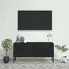 A black TV stand with decorative items on top, placed against a white wall with a large black framed picture above it. The floor has a herringbone pattern. Anteprima dell’immagine prodotto